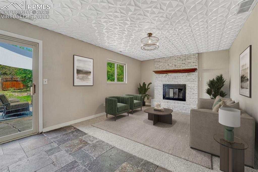 Image 13 of 50: Family room virtually staged