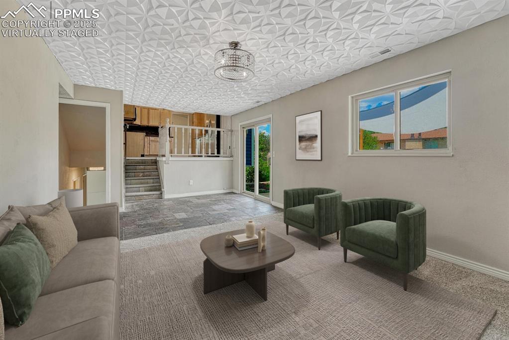 Image 14 of 50: Family room virtually staged