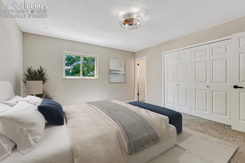 Image 16 of 50: Primary bedroom virtually staged