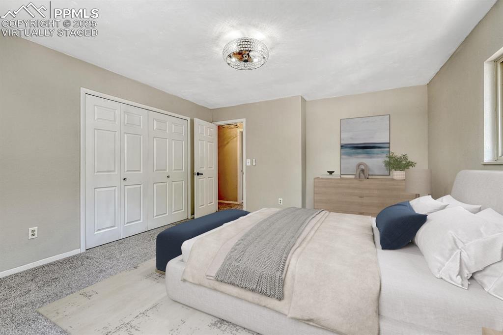 Image 17 of 50: Primary bedroom virtually staged