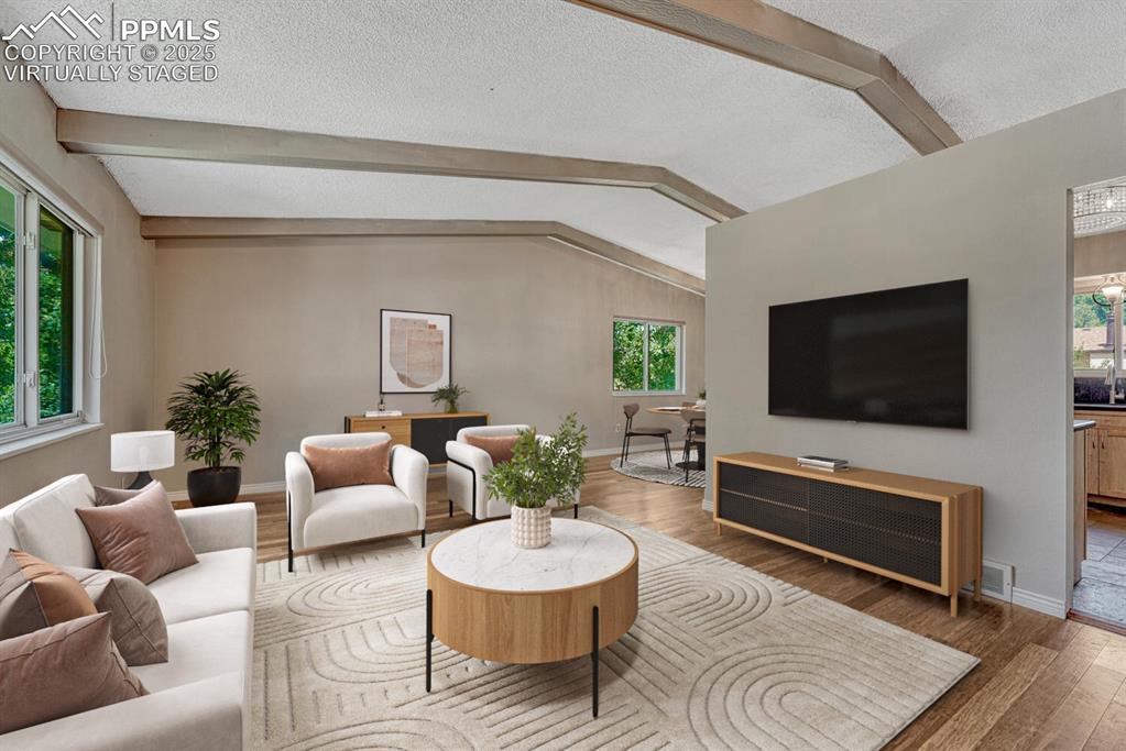 Image 3 of 50: Great room virtually staged