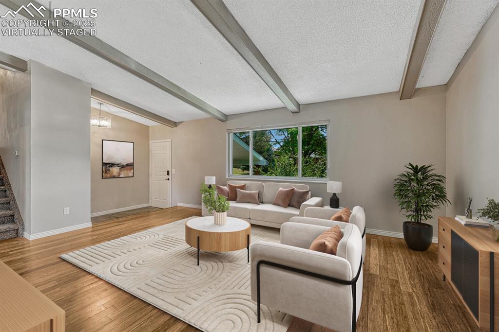 Image 4 of 50: Great room virtually staged