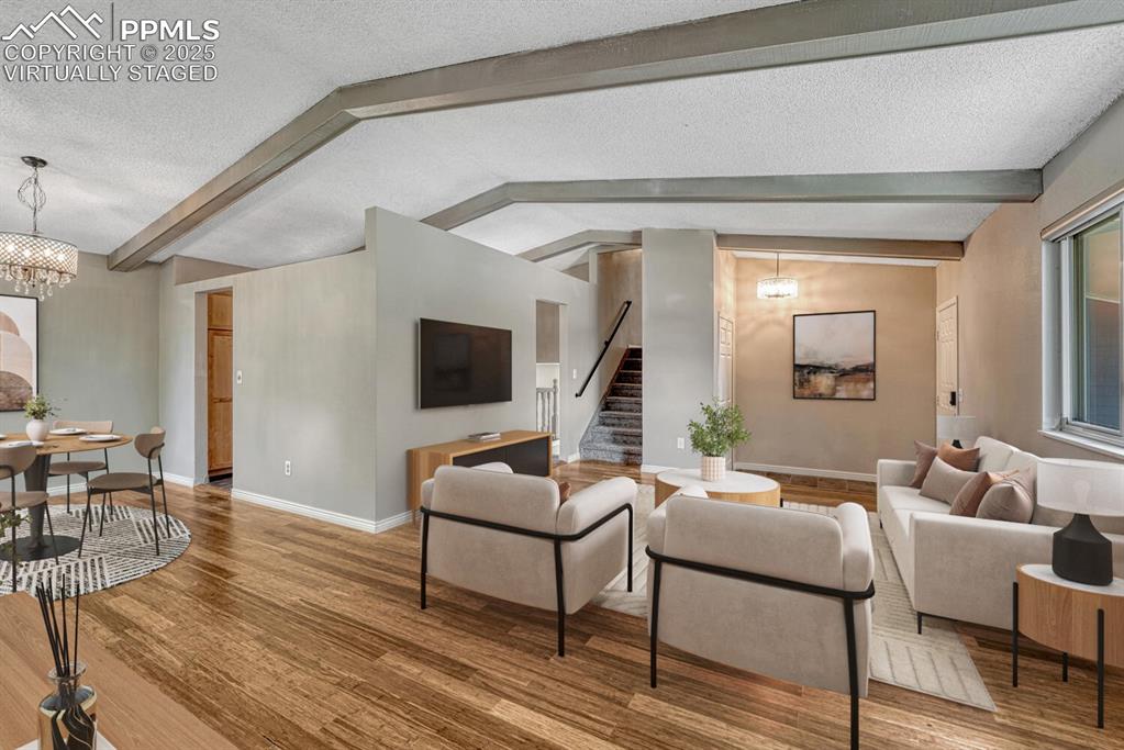 Image 5 of 50: Great room virtually staged