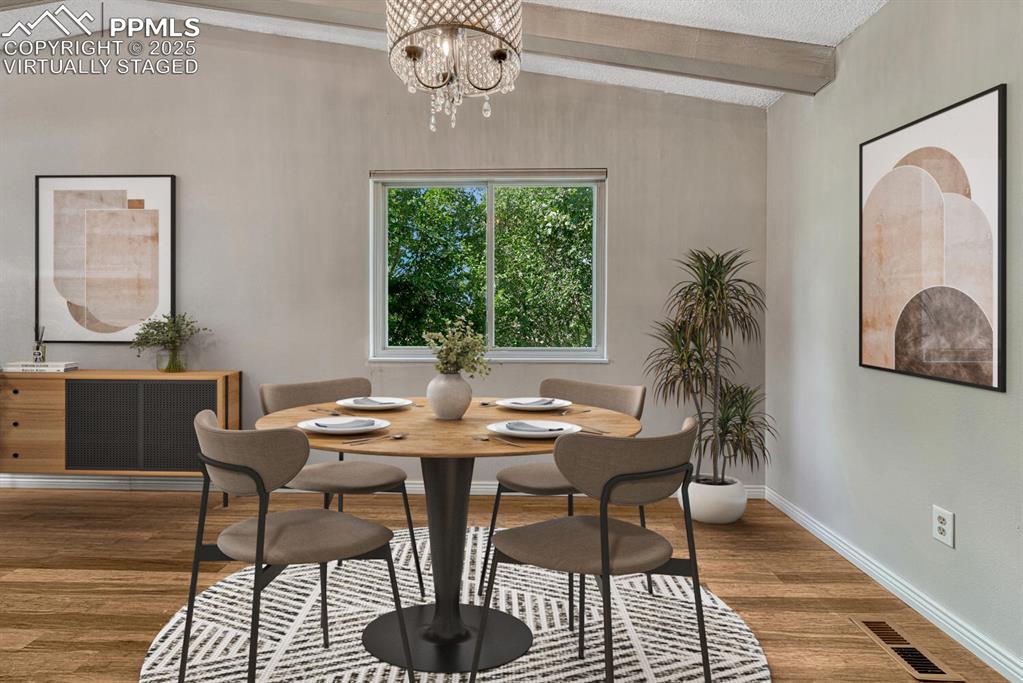 Image 6 of 50: Dining room virtually staged