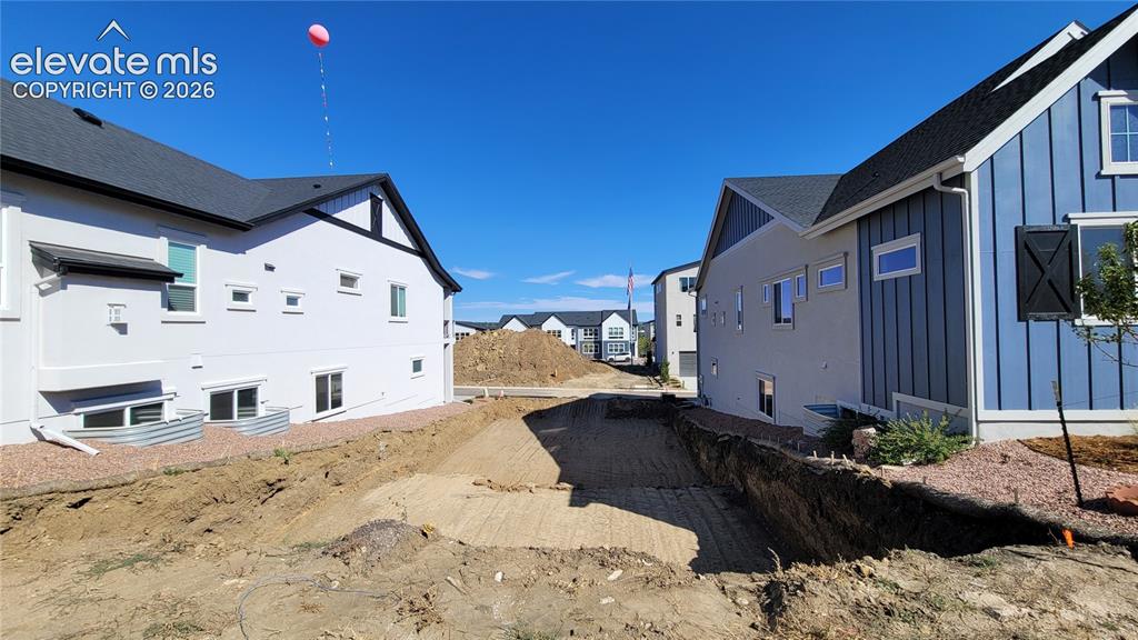 Caption: Manchester-Ranch Plan-Modern Elevation-2 Car Tuck Under Garage! Please, excuse our dust as this home