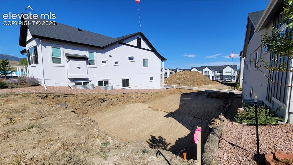 Image 2 of 6: Manchester-Ranch Plan-Modern Elevation-2 Car Tuck Under Garage! Please, exc