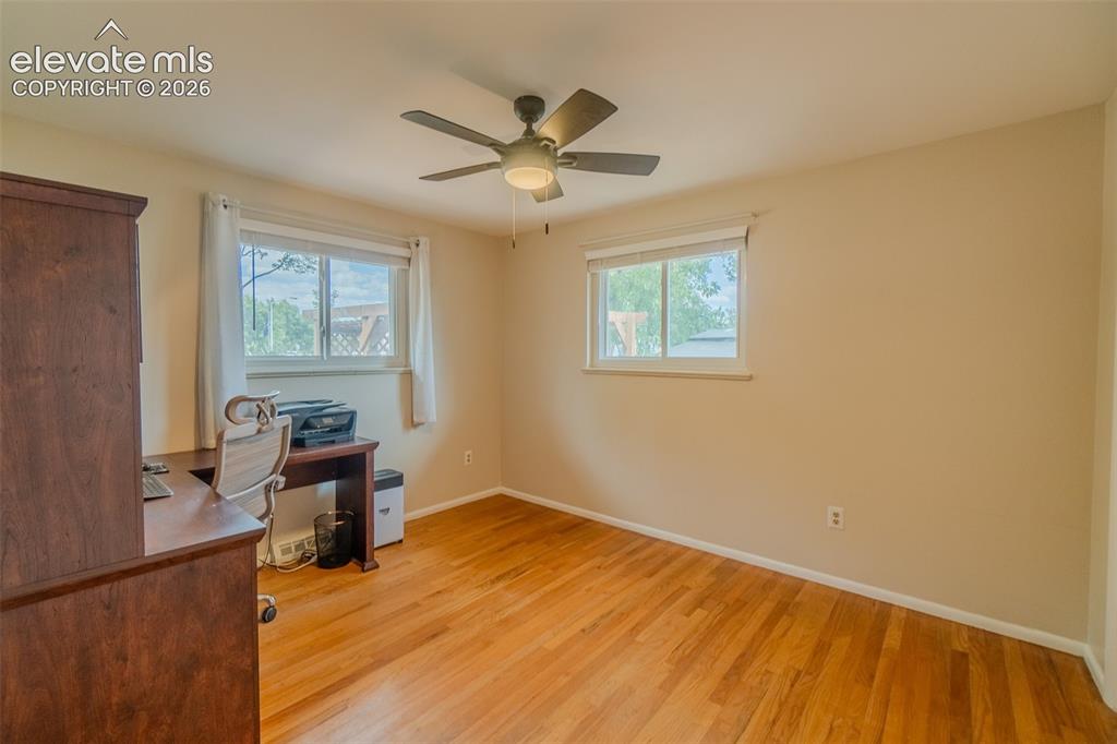 Image 19 of 46: Kitchen featuring wood-finish flooring and recessed lighting