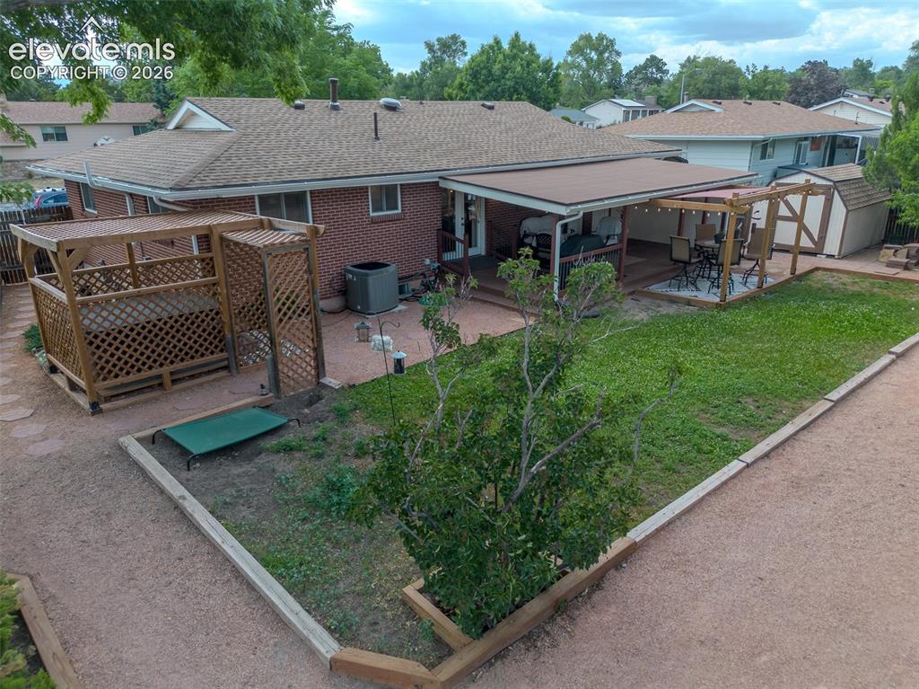 Image 2 of 46: Brick exterior with a new roof, Large corner lot, beautiful landscaping