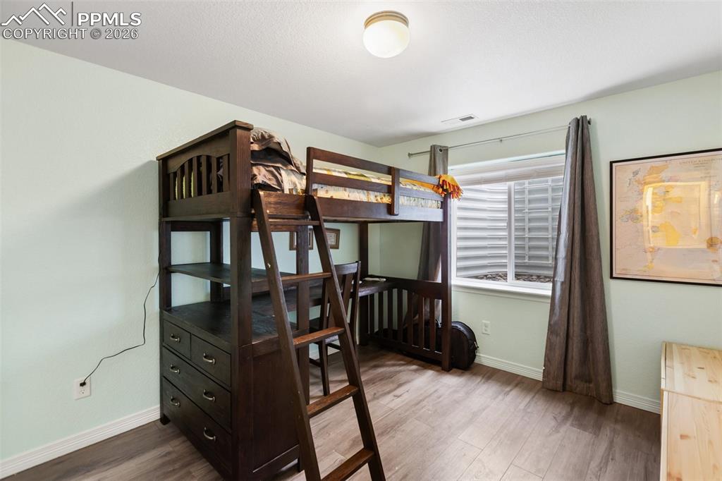 Image 29 of 34: Bright bedrooms with clean, modern feel