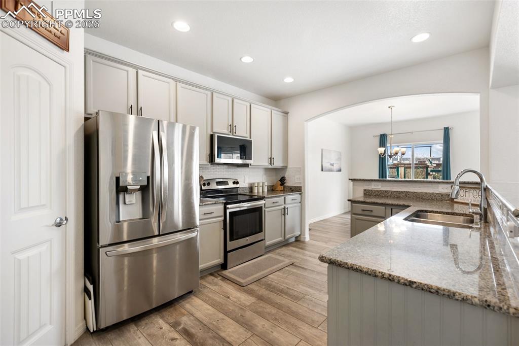 Image 3 of 34: Light-filled kitchen perfect for entertaining