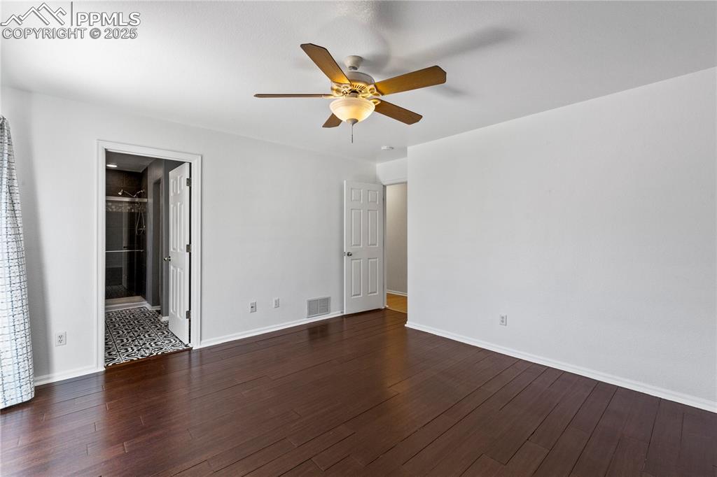 Image 14 of 34: Master Bedroom