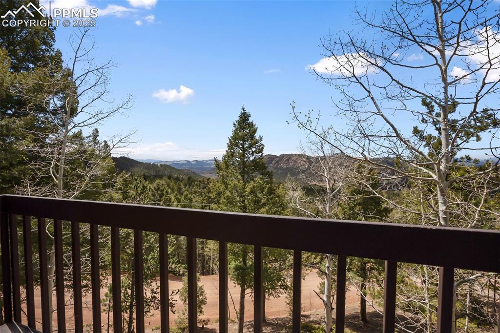 Image 15 of 49: View of mountain backdrop from front deck