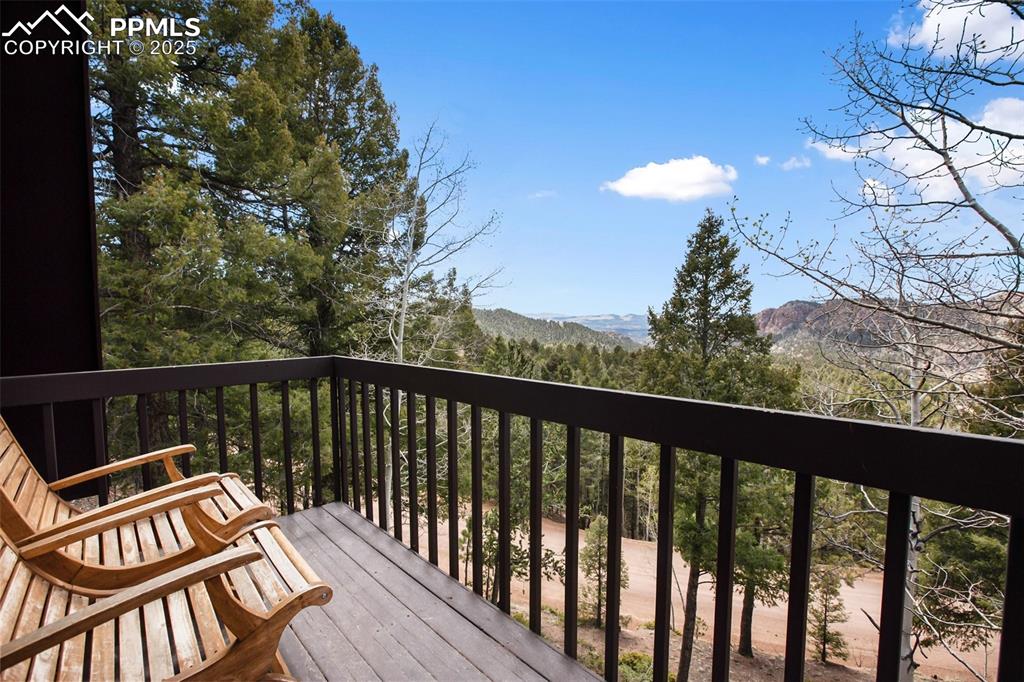 Image 3 of 49: Deck off of Master bedroom with views