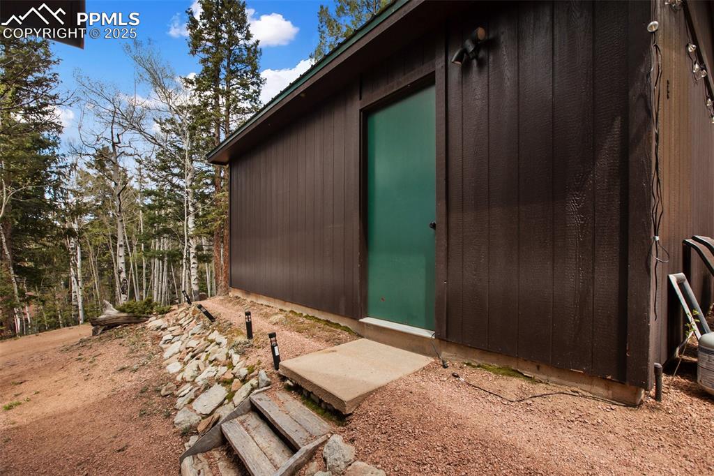 Image 34 of 49: View of exterior entry into garage
