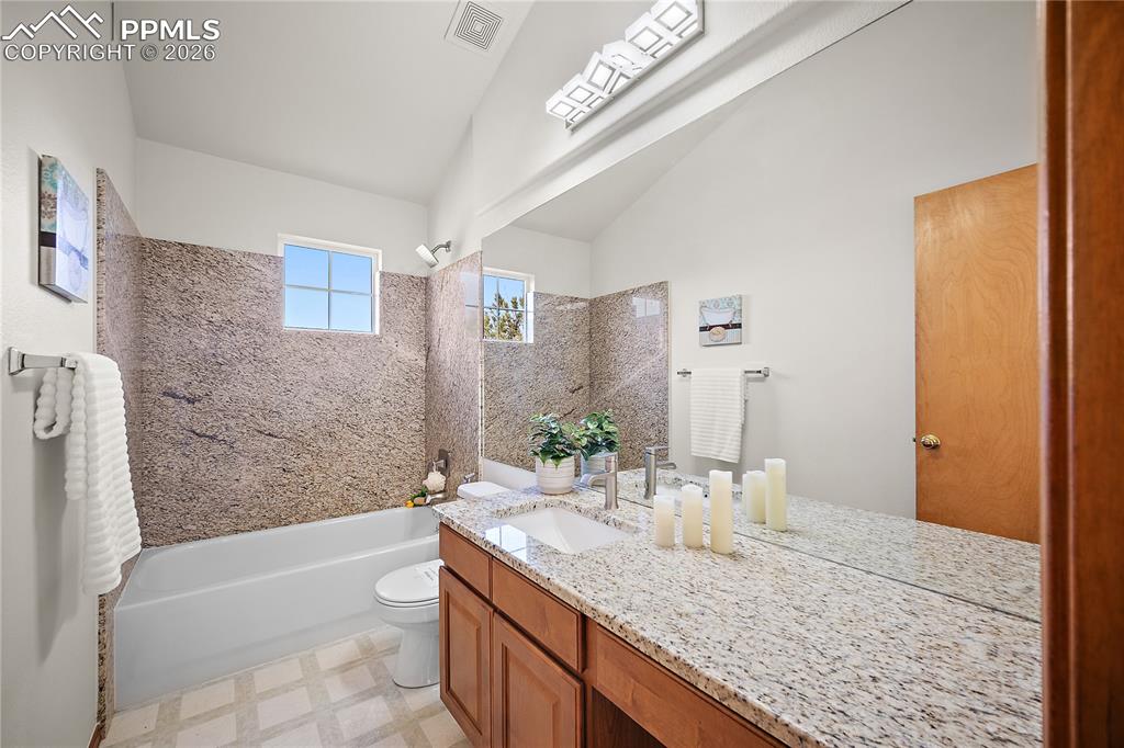 Image 24 of 44: Upstairs full bath