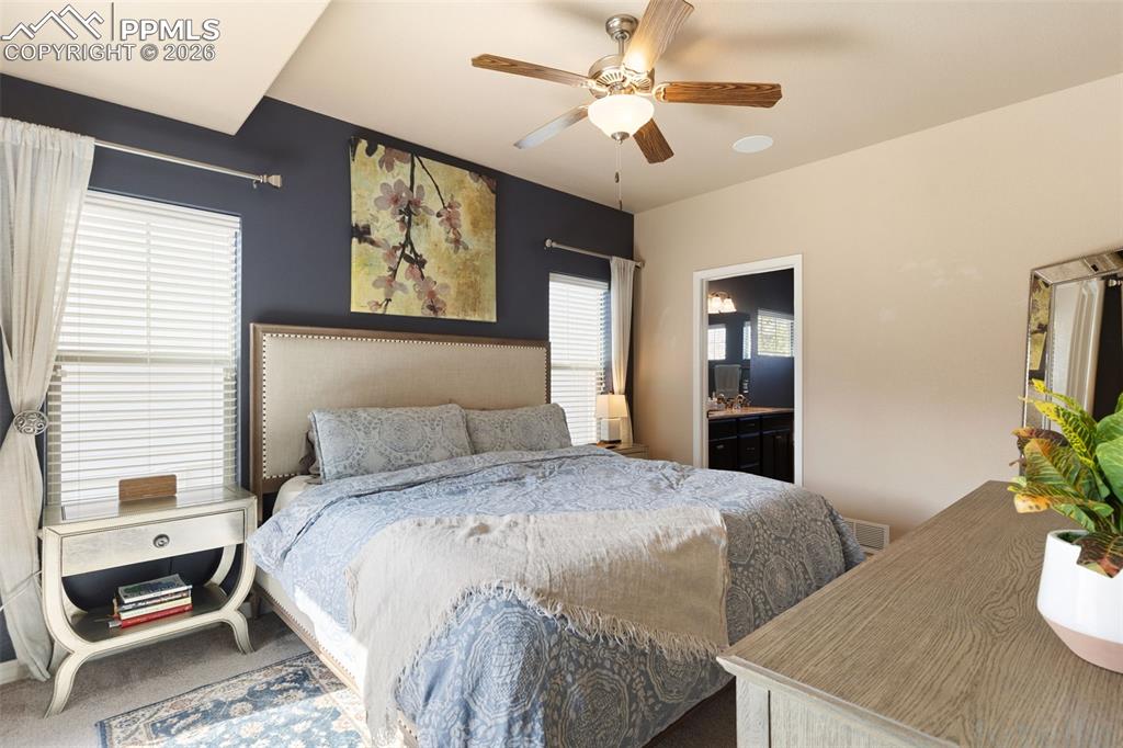 Image 16 of 45: Main level primary suite