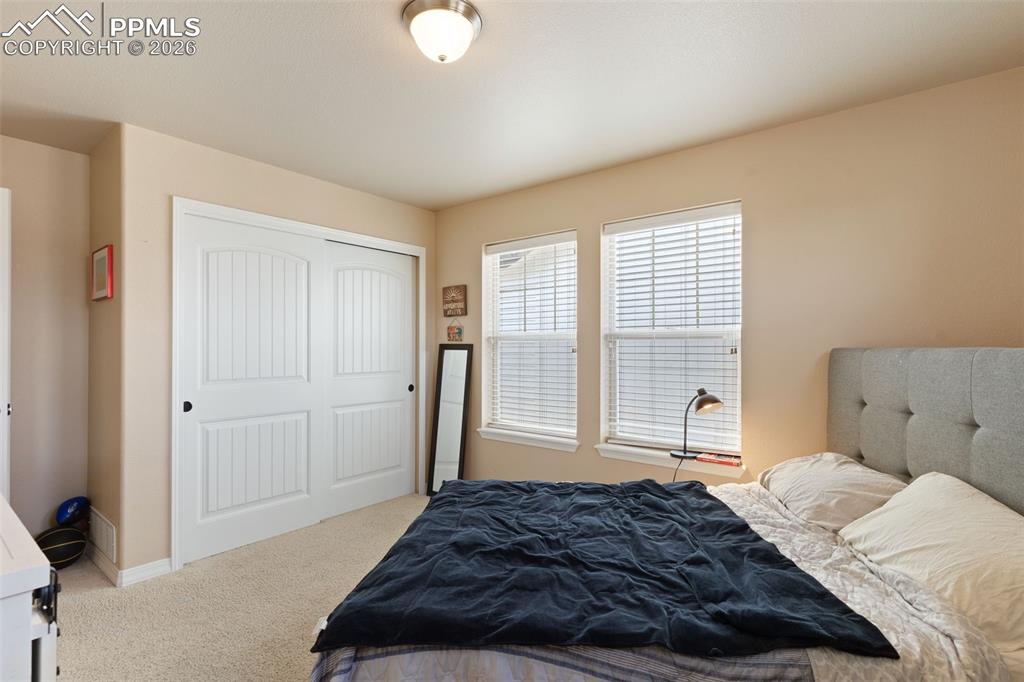 Image 29 of 45: Upper level bedroom