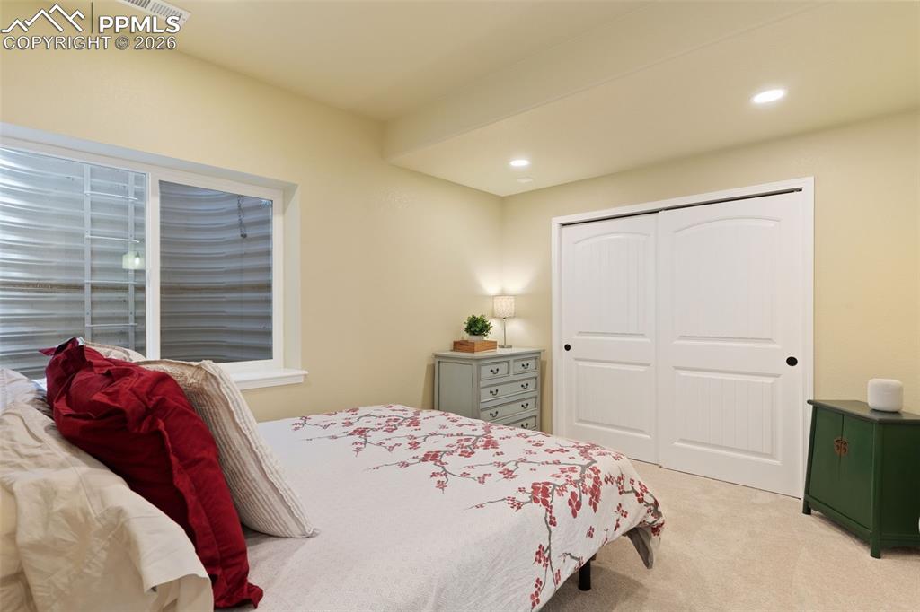 Image 32 of 45: Basement bedroom
