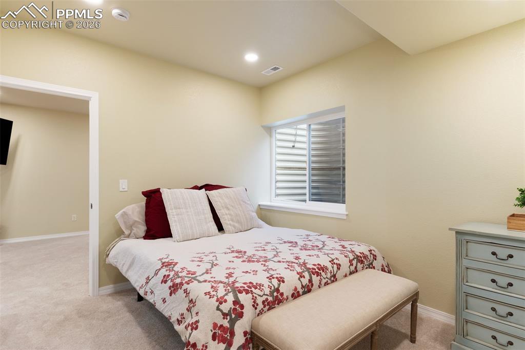 Image 33 of 45: Basement bedroom