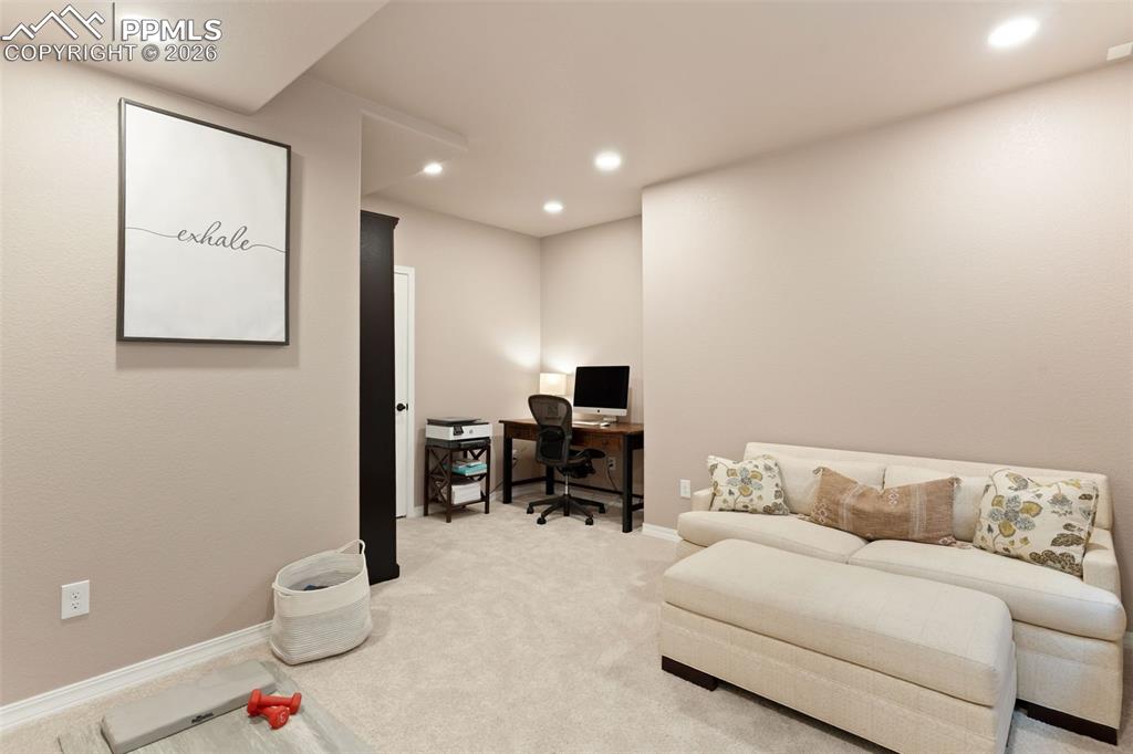 Image 35 of 45: Another bedroom in the basement also makes for a great office