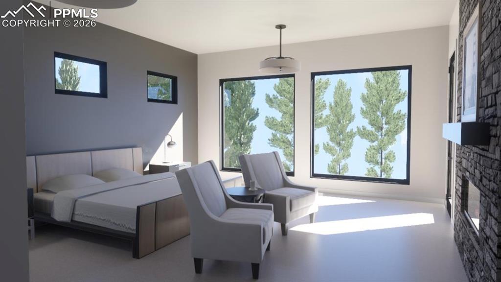 Image 14 of 45: Bedroom with linear stone gas fireplace