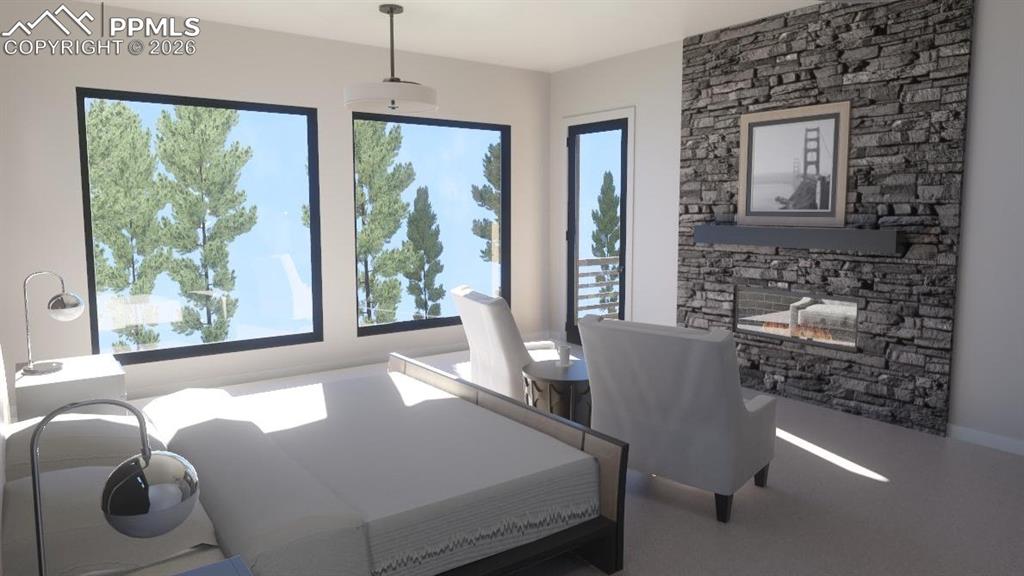 Image 15 of 45: Bedroom with linear stone gas fireplace