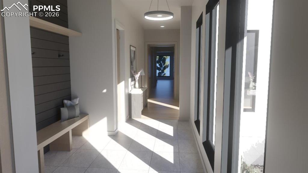 Image 26 of 45: Expansive mudroom with built-in bench