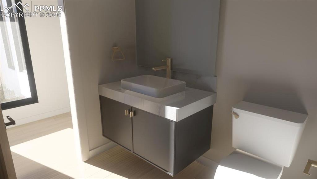 Image 28 of 45: Main-level powder bath
