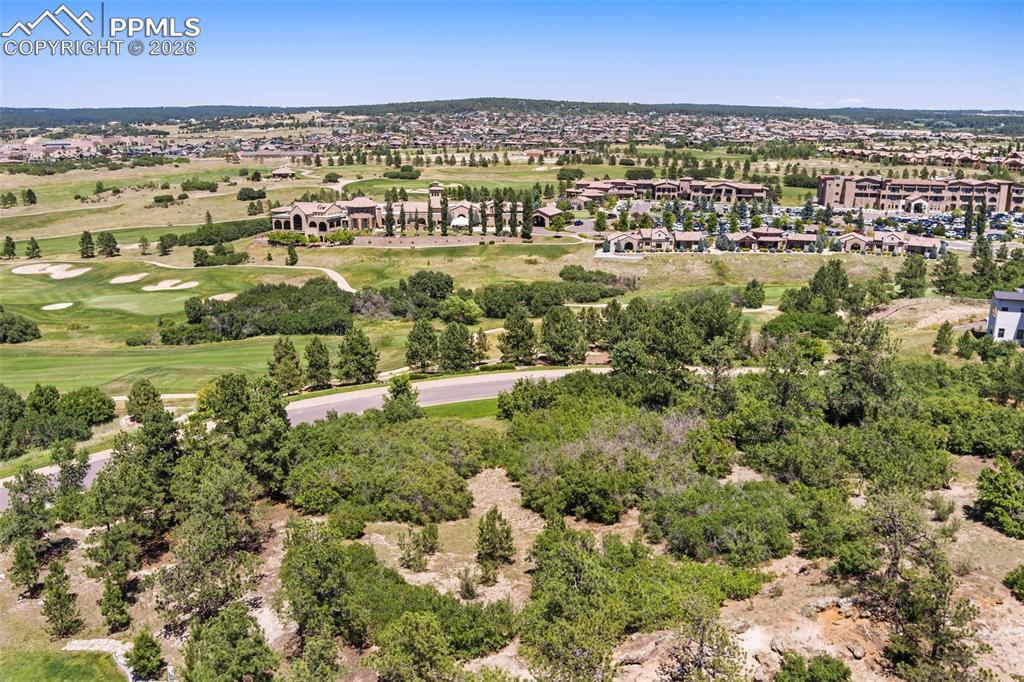 Image 40 of 45: Clubhouse and golf course view