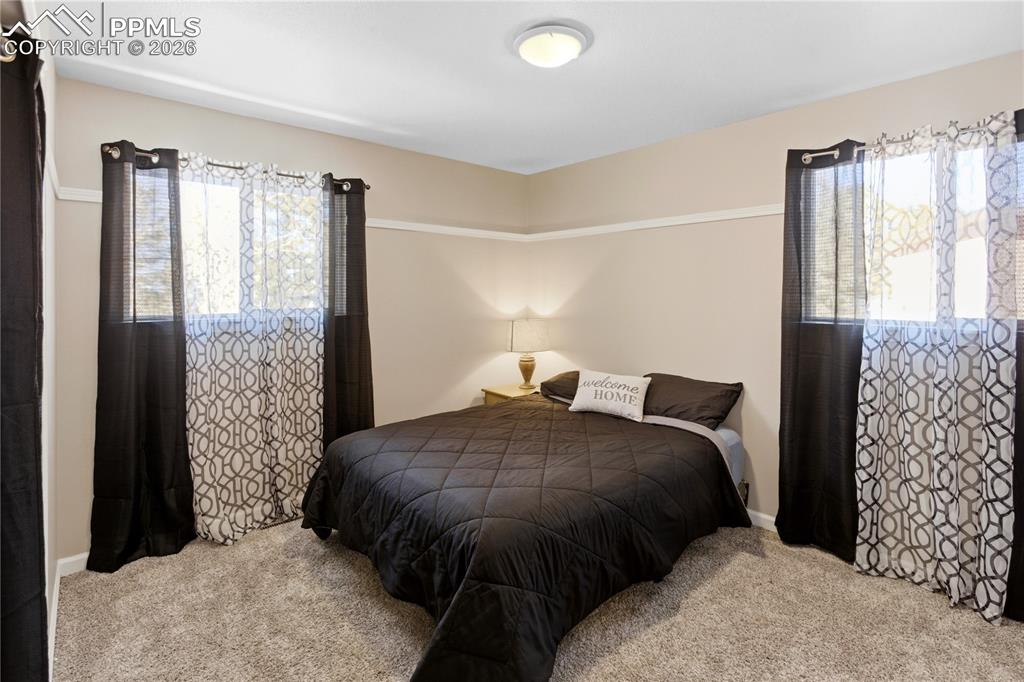 Image 21 of 42: Main Level Bed 2 - Virtually Staged