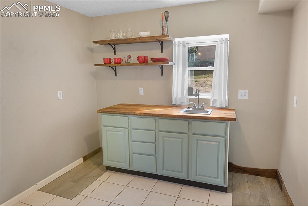 Image 24 of 42: Lower Level Kitchen-Dining