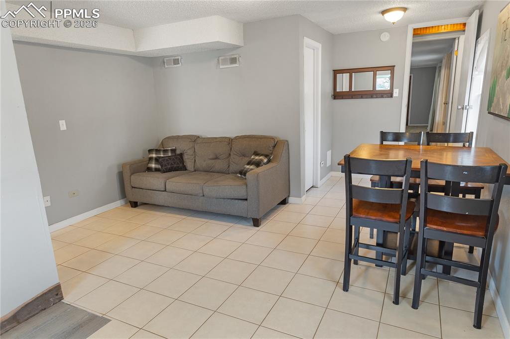 Image 25 of 42: Lower Level Kitchen-Dining