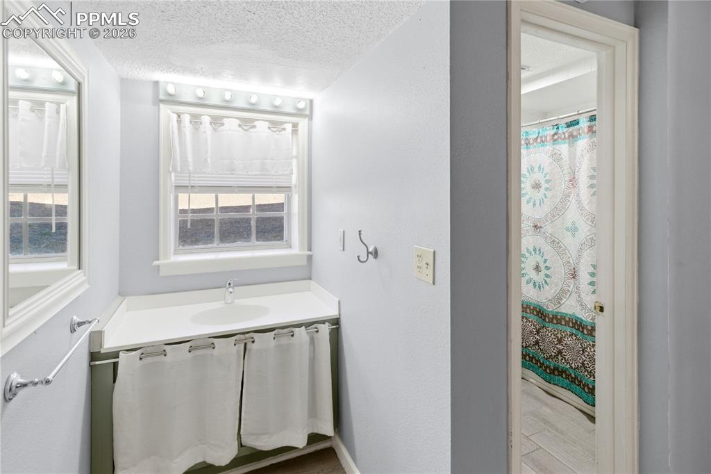 Image 26 of 42: Lower Level Kitchen-Dining