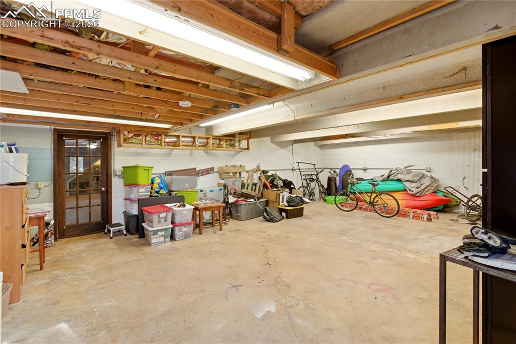 Image 34 of 42: Lower Level Pool-PingPong Room - Virtually Staged