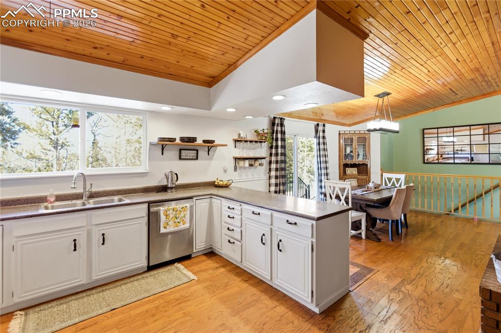 Image 8 of 42: Dining-Kitchen-Living Room