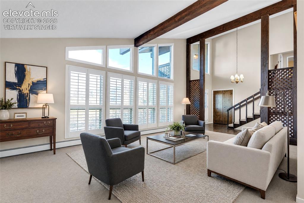 Image 2 of 50: Virtually staged. Living room reimagined with current architectural details