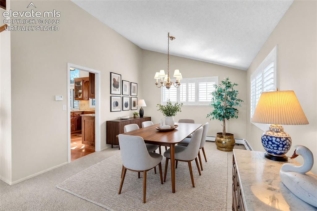 Image 4 of 50: Virtually staged. Dining room.