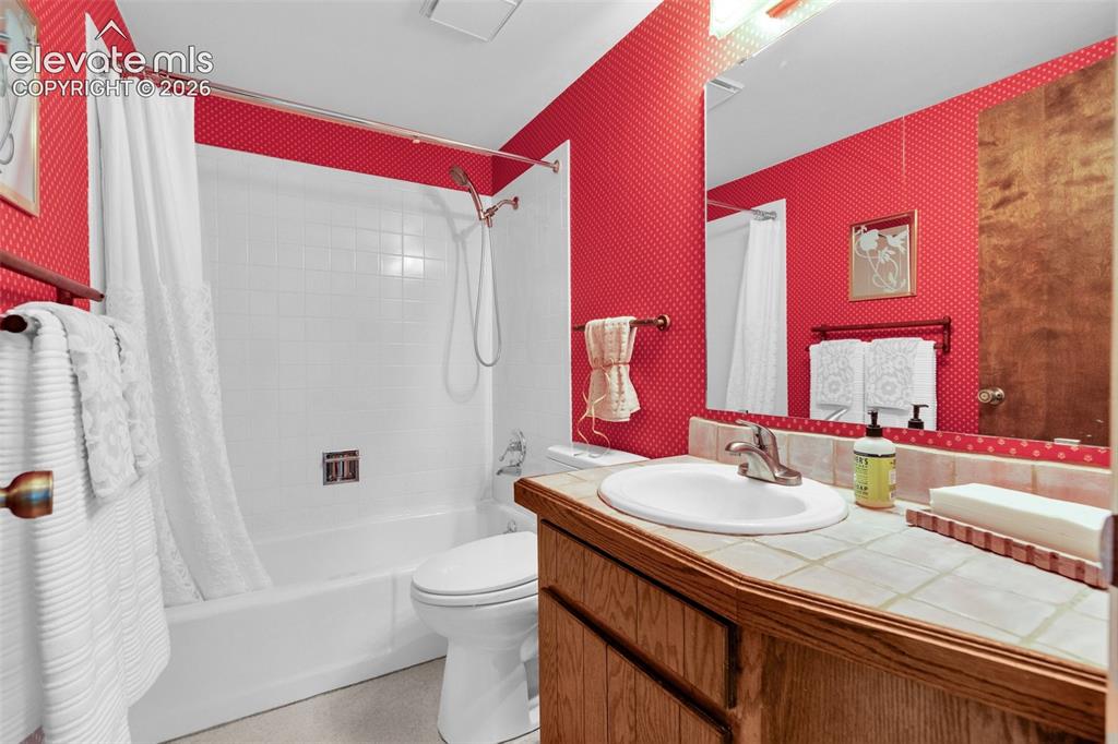 Image 42 of 50: Main level bathroom.