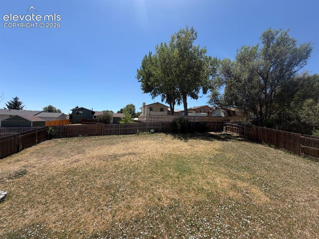 Image 18 of 18: Large backyard with plenty of space