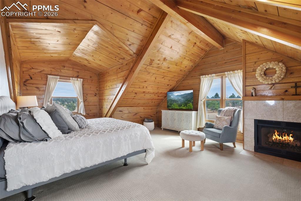 Image 4 of 50: Primary Bedroom with Fireplace