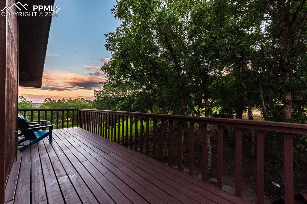 Image 35 of 39: View of deck at dusk