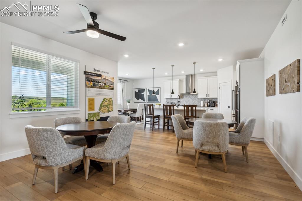 Image 4 of 23: Dining space featuring recessed lighting, light wood finished floors, baseb