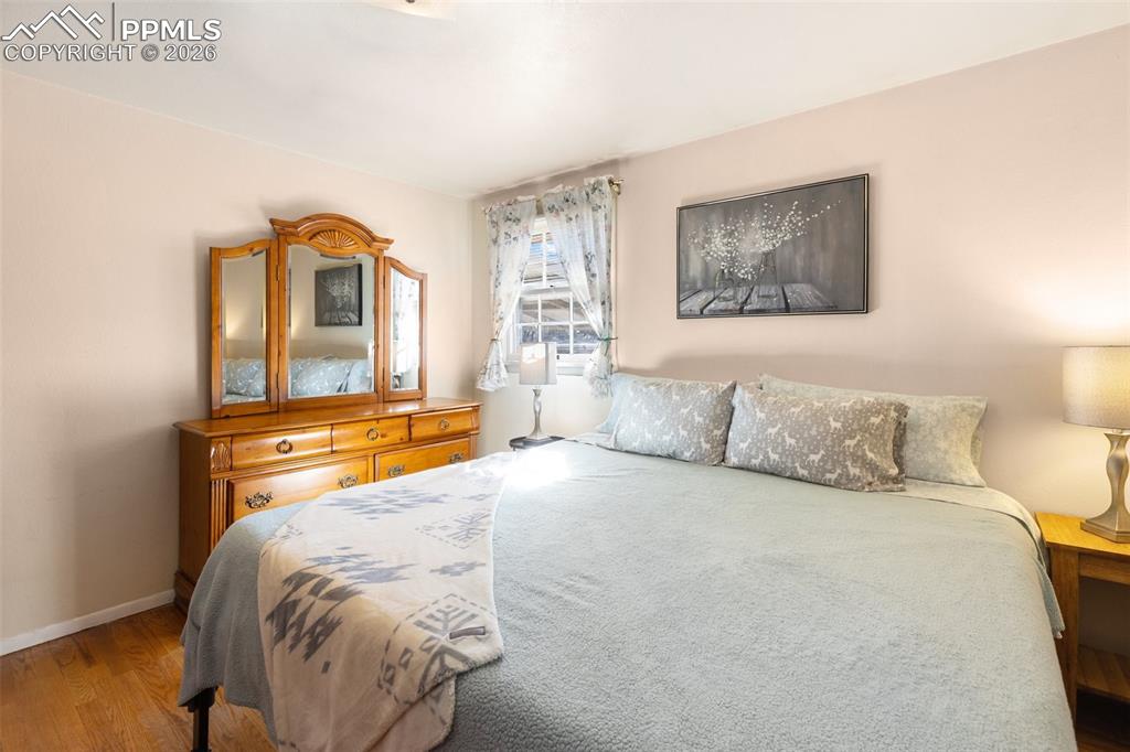 Image 14 of 24: Inviting bedroom with a cozy, peaceful feel