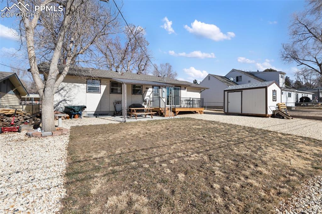 Image 24 of 24: The back deck is the perfect spot to unwind in the evening