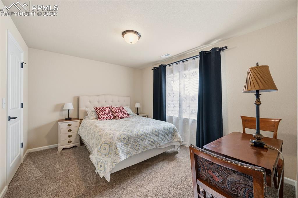 Image 29 of 38: Bedroom