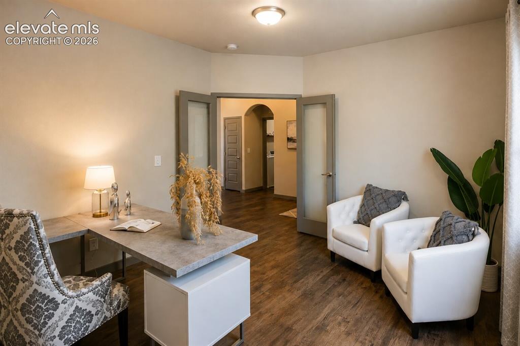 Image 15 of 31: Private office with French doors