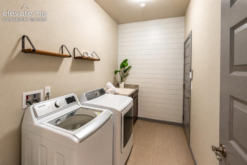Image 30 of 31: Spacious Laundry Room 