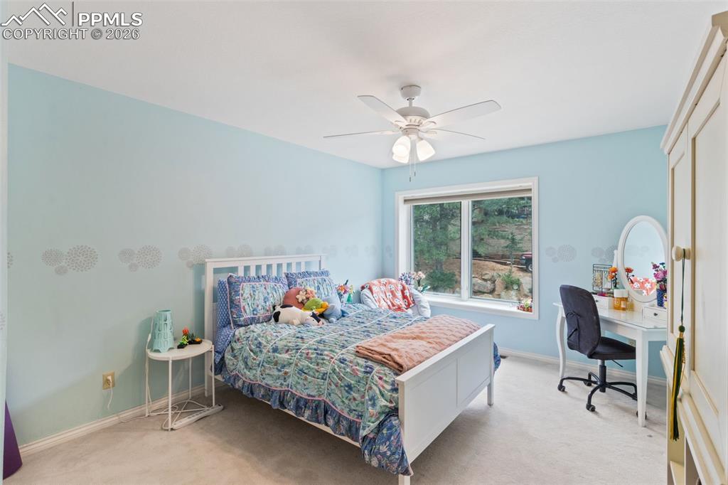 Image 32 of 47: Bedroom on upper level