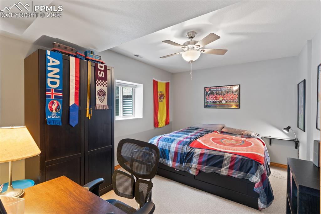 Image 37 of 47: Basement bedroom