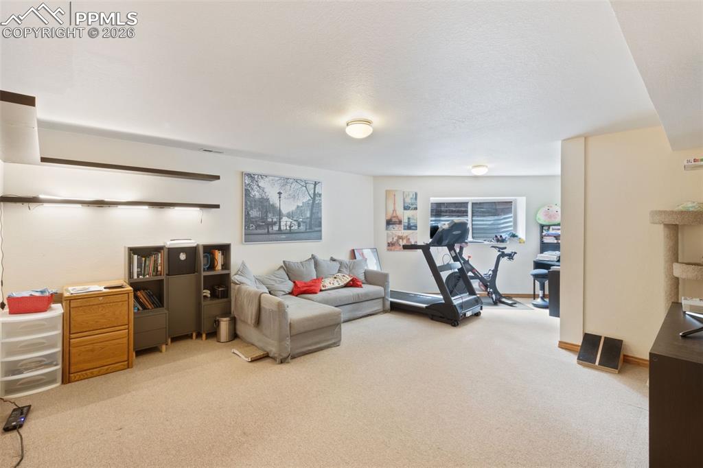 Image 39 of 47: Fully finished basement living room